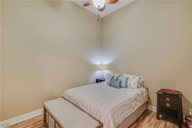 bedroom featuring light hardwood / wood-style flooring and ceiling fan