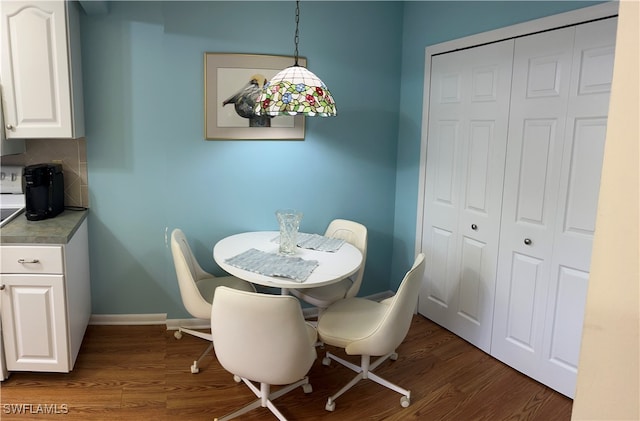 dining room featuring dark hardwood / wood-style floors