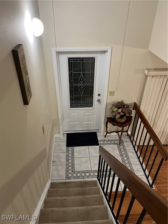 stairway with wood-type flooring