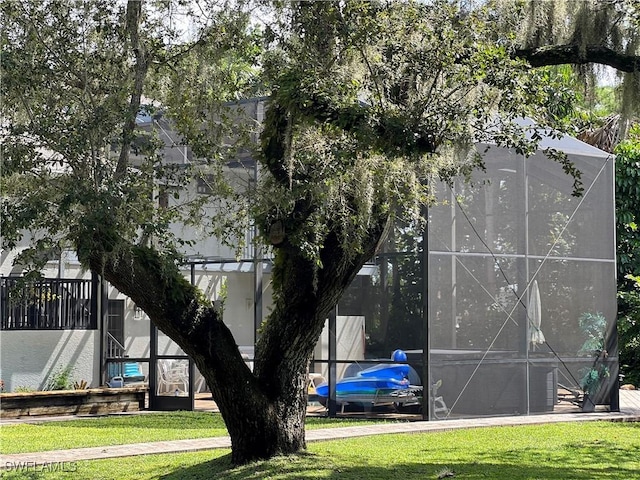 view of outdoor structure with a lawn