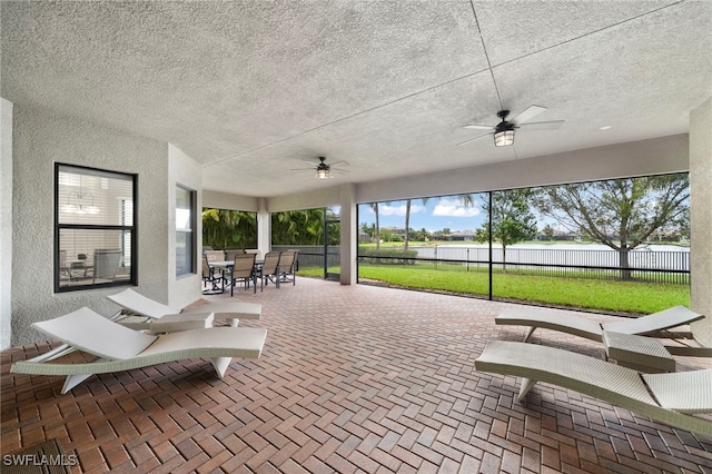 4365 Caldera Cir, Naples, FL 34119 - view of patio / terrace with ceiling fan and outdoor dining space