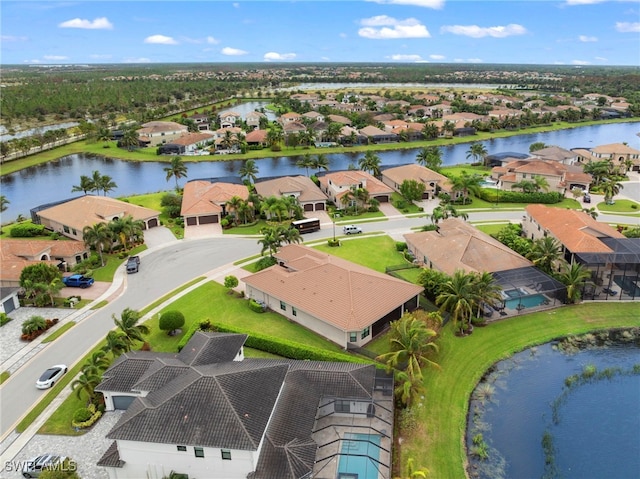 drone / aerial view with a water view