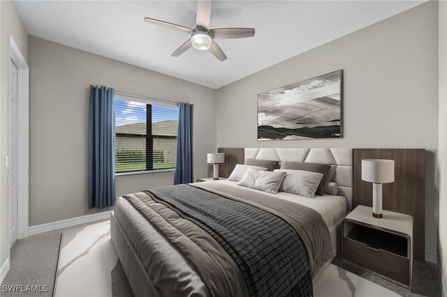 4365 Caldera Cir, Naples, FL 34119 - carpeted bedroom featuring baseboards and ceiling fan