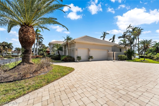 view of front of property featuring a garage