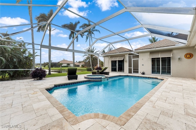 view of swimming pool featuring an in ground hot tub, a patio, and glass enclosure