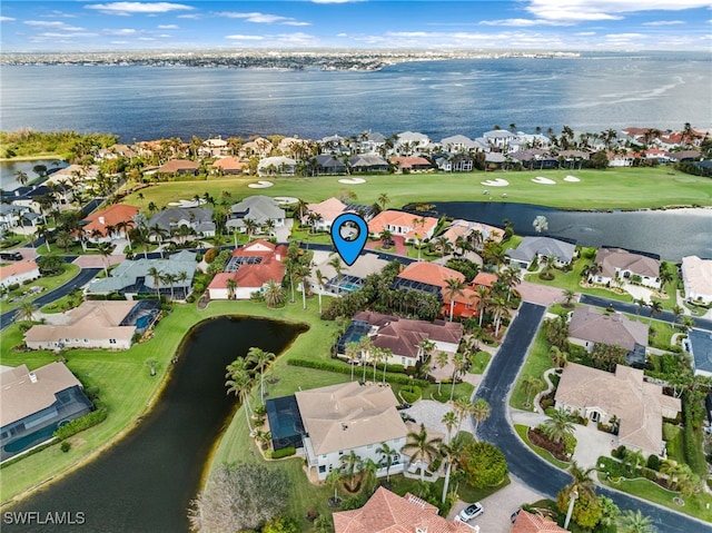 drone / aerial view with a water view