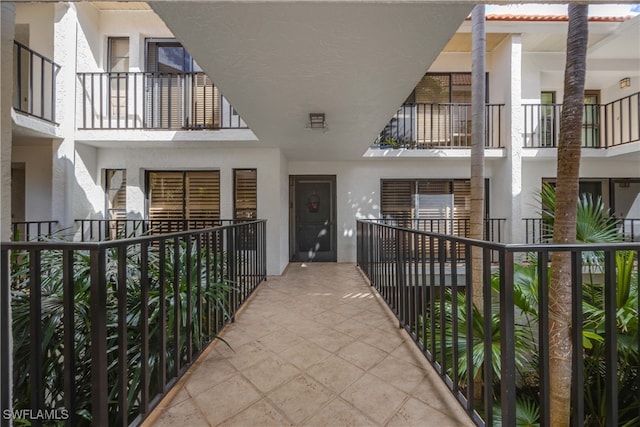 interior space with a balcony