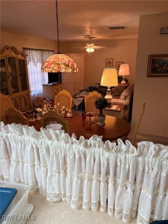 dining area with ceiling fan