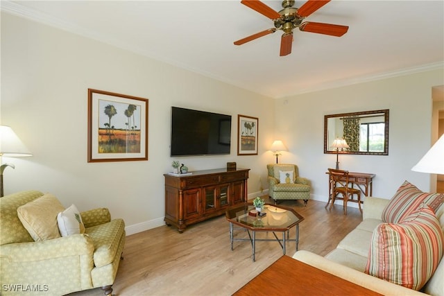 living room with ceiling fan and light wood-type flooring