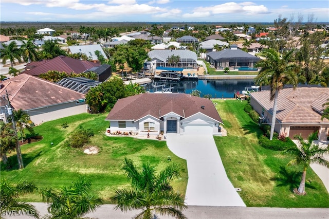 drone / aerial view with a water view