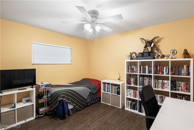 bedroom featuring dark wood-type flooring and ceiling fan