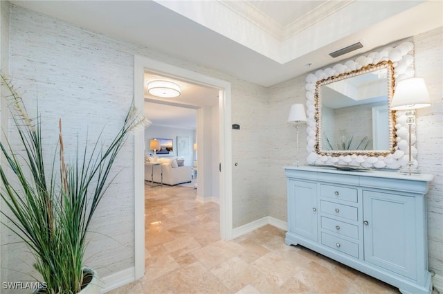 bathroom with vanity and ornamental molding