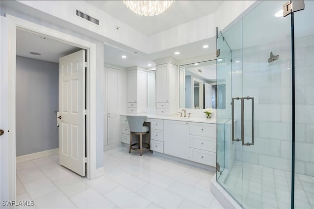 bathroom with vanity, tile patterned floors, and an enclosed shower