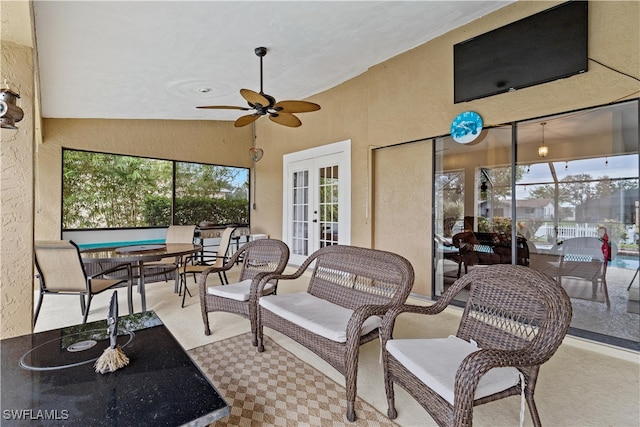 view of patio with french doors and ceiling fan