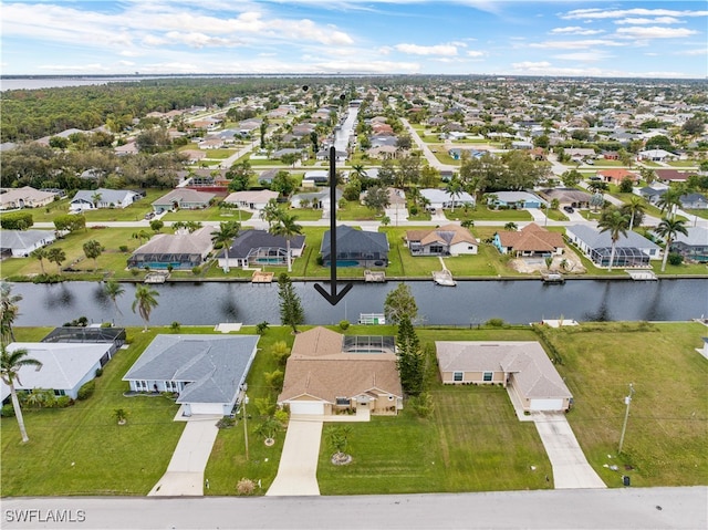 drone / aerial view with a water view