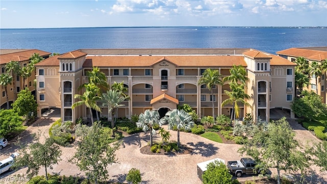 view of property with a water view