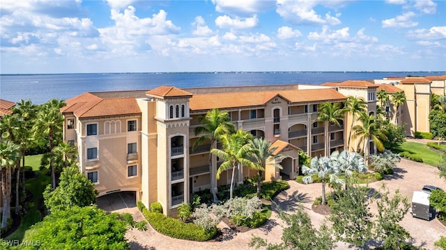 drone / aerial view with a water view