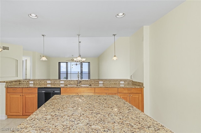 kitchen with dishwasher, pendant lighting, light tile patterned floors, and sink