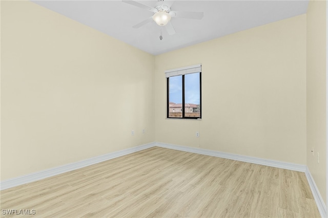 spare room with ceiling fan and light hardwood / wood-style floors