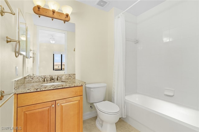 full bathroom with tile patterned floors, vanity, toilet, and shower / tub combo