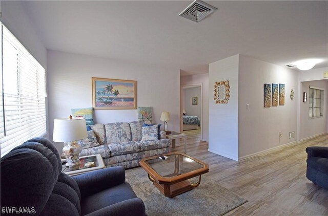 living room featuring light wood-type flooring