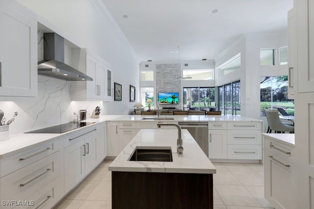 kitchen with wall chimney exhaust hood, a peninsula, black electric cooktop, crown molding, and stainless steel dishwasher