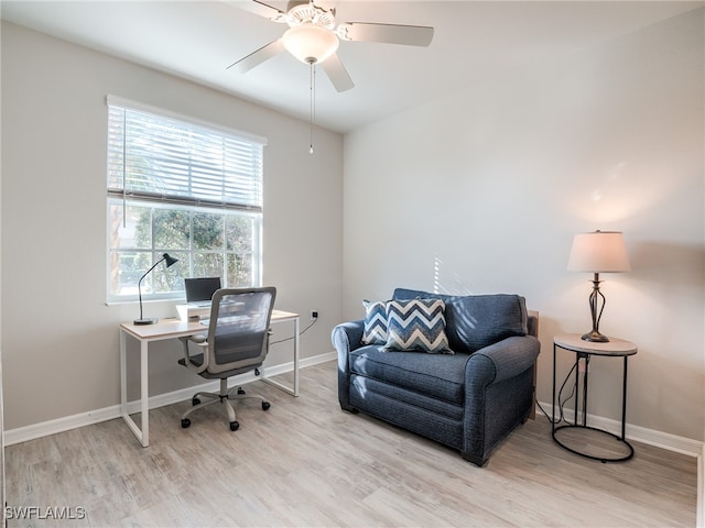 office space featuring ceiling fan and light wood-type flooring