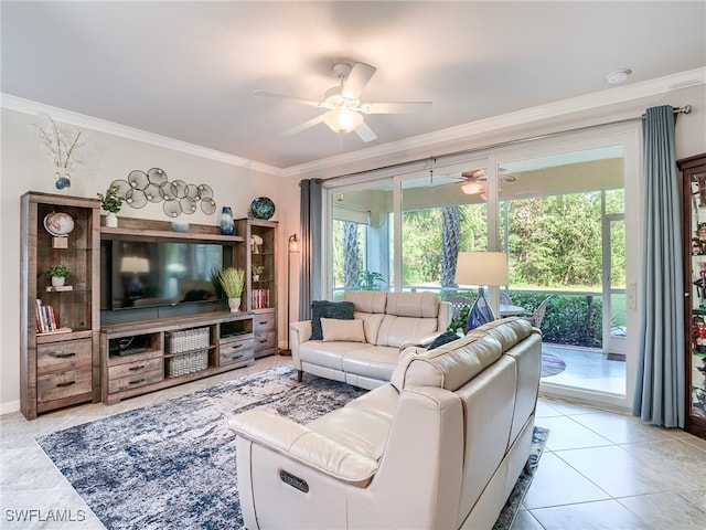 living room with tile patterned floors, ceiling fan, a healthy amount of sunlight, and crown molding