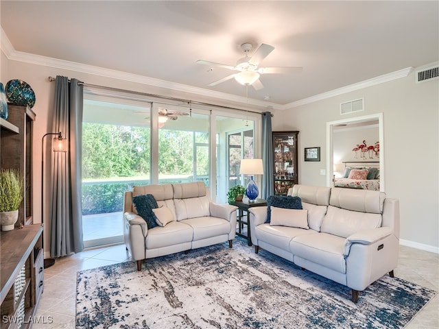 living room with ceiling fan, light tile patterned floors, and ornamental molding