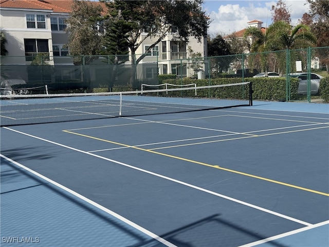 view of tennis court with basketball court