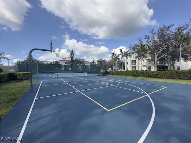 view of basketball court featuring tennis court