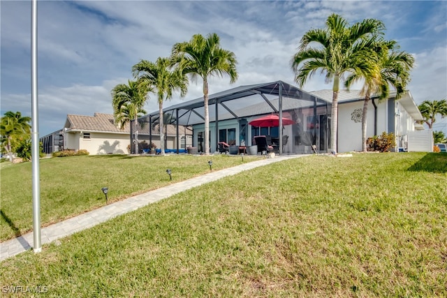 view of yard featuring a lanai