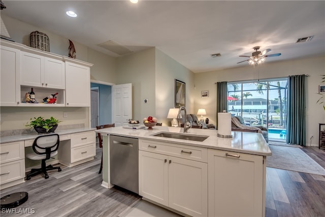 kitchen with dishwasher, sink, light hardwood / wood-style flooring, ceiling fan, and white cabinetry