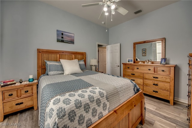 bedroom featuring light hardwood / wood-style floors and ceiling fan