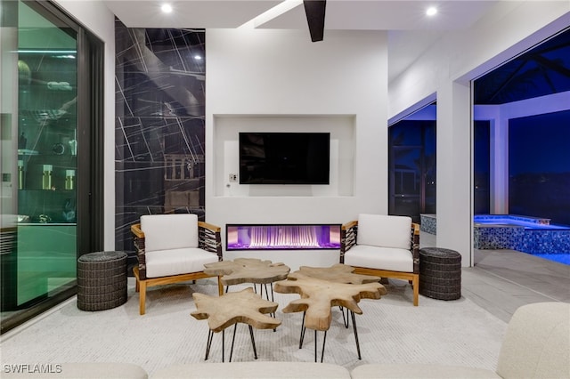 view of patio / terrace with a jacuzzi and ceiling fan