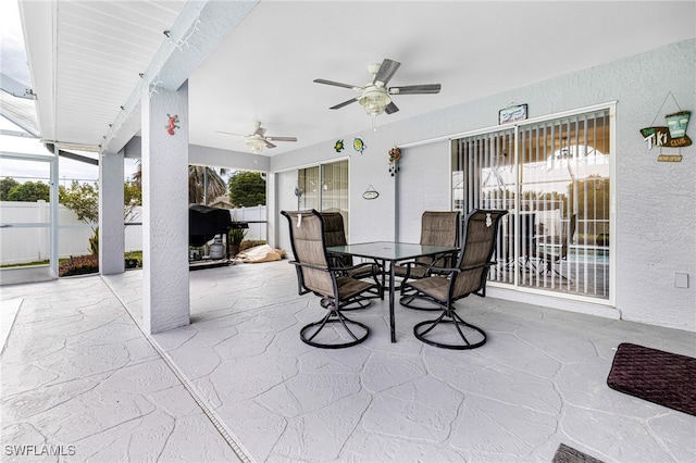 300 Morse Plz, Fort Myers, FL 33905 - view of patio / terrace with outdoor dining area, ceiling fan, and fence
