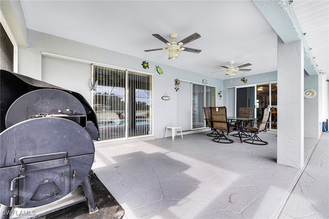 view of patio / terrace with ceiling fan