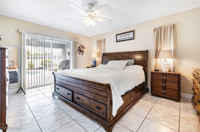 bedroom featuring access to exterior, light tile patterned flooring, and ceiling fan