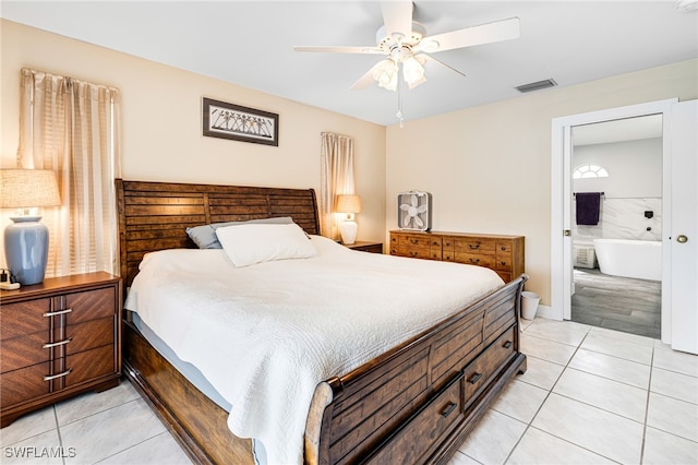 bedroom with ceiling fan and light tile patterned floors