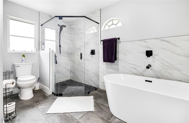 300 Morse Plz, Fort Myers, FL 33905 - full bathroom with a freestanding bath, a marble finish shower, toilet, and a wealth of natural light