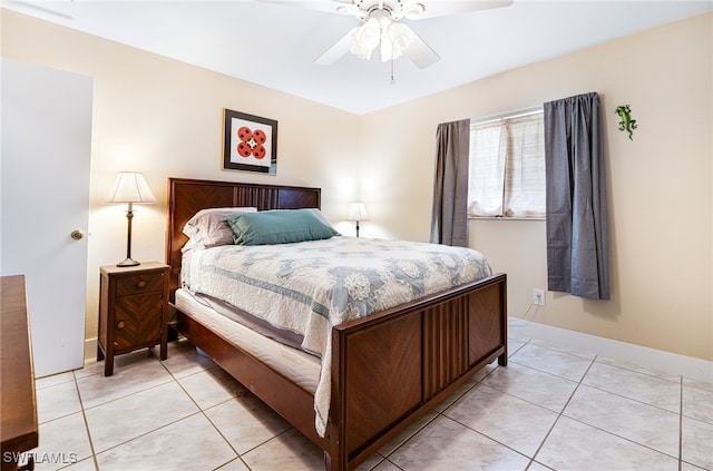 bedroom with light tile patterned flooring and ceiling fan