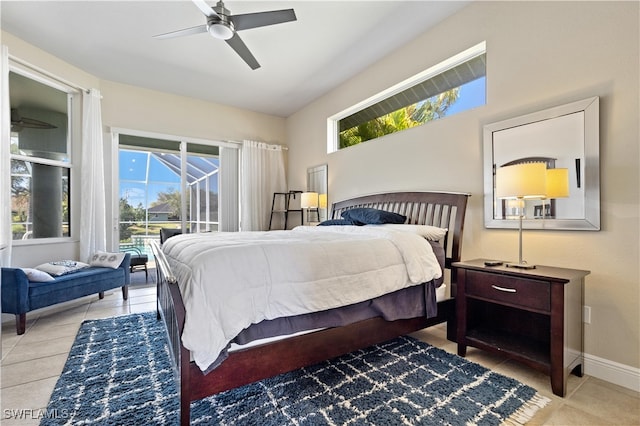 bedroom with ceiling fan and light tile patterned floors