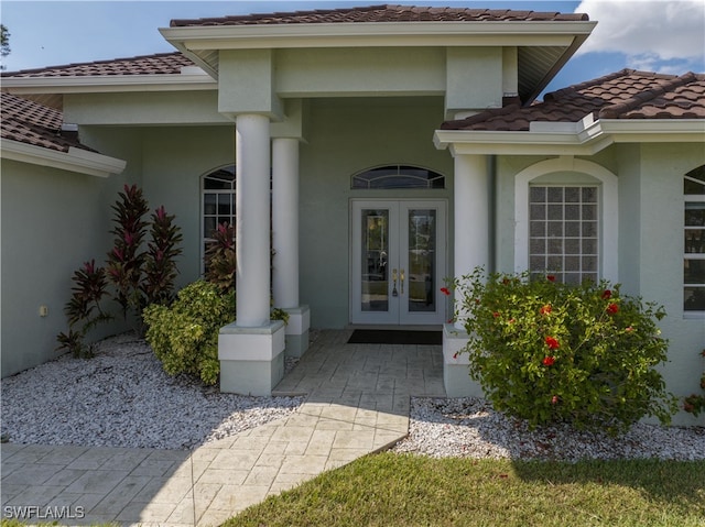 entrance to property featuring french doors