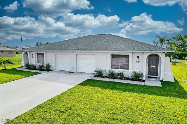single story home featuring a garage, a front lawn, concrete driveway, stucco siding, and roof with shingles