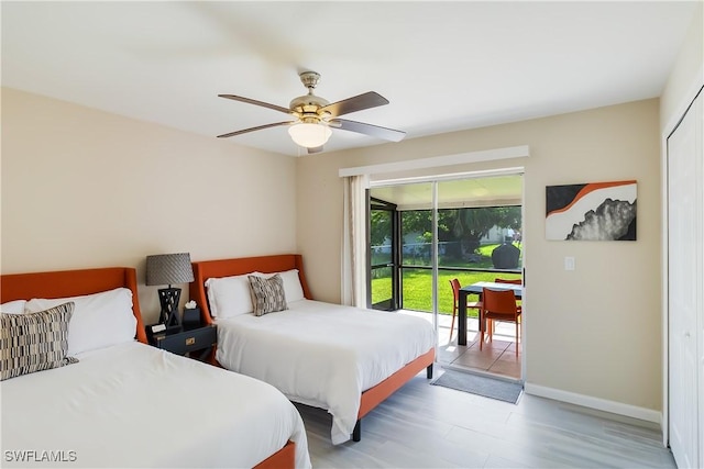 bedroom featuring access to exterior, light wood-type flooring, baseboards, and ceiling fan