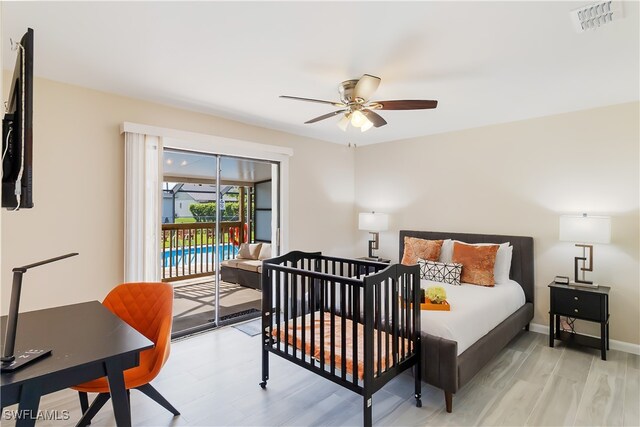 bedroom featuring light wood-type flooring and ceiling fan