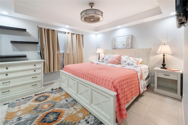 190 Pebble Beach Blvd Unit 103, Naples, FL 34113 - bedroom featuring a tray ceiling, recessed lighting, baseboards, and light tile patterned floors