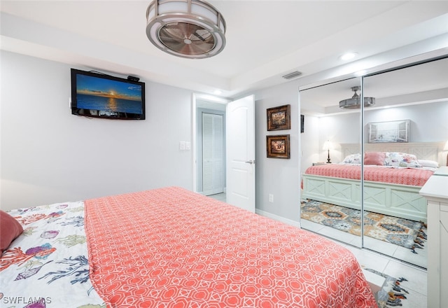 190 Pebble Beach Blvd Unit 103, Naples, FL 34113 - tiled bedroom featuring a closet, recessed lighting, and baseboards