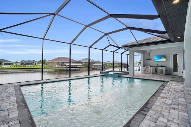 view of swimming pool with a patio, a lanai, and a water view