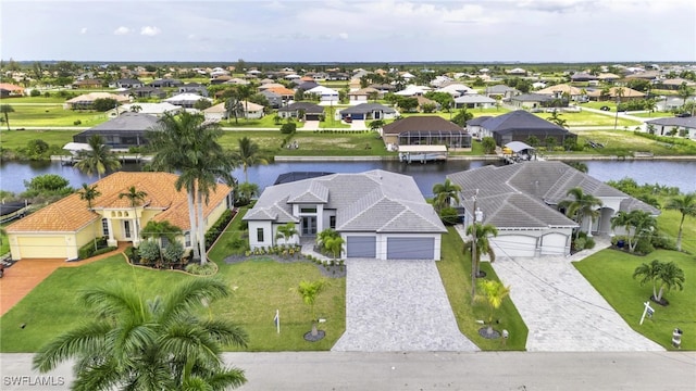 birds eye view of property featuring a water view